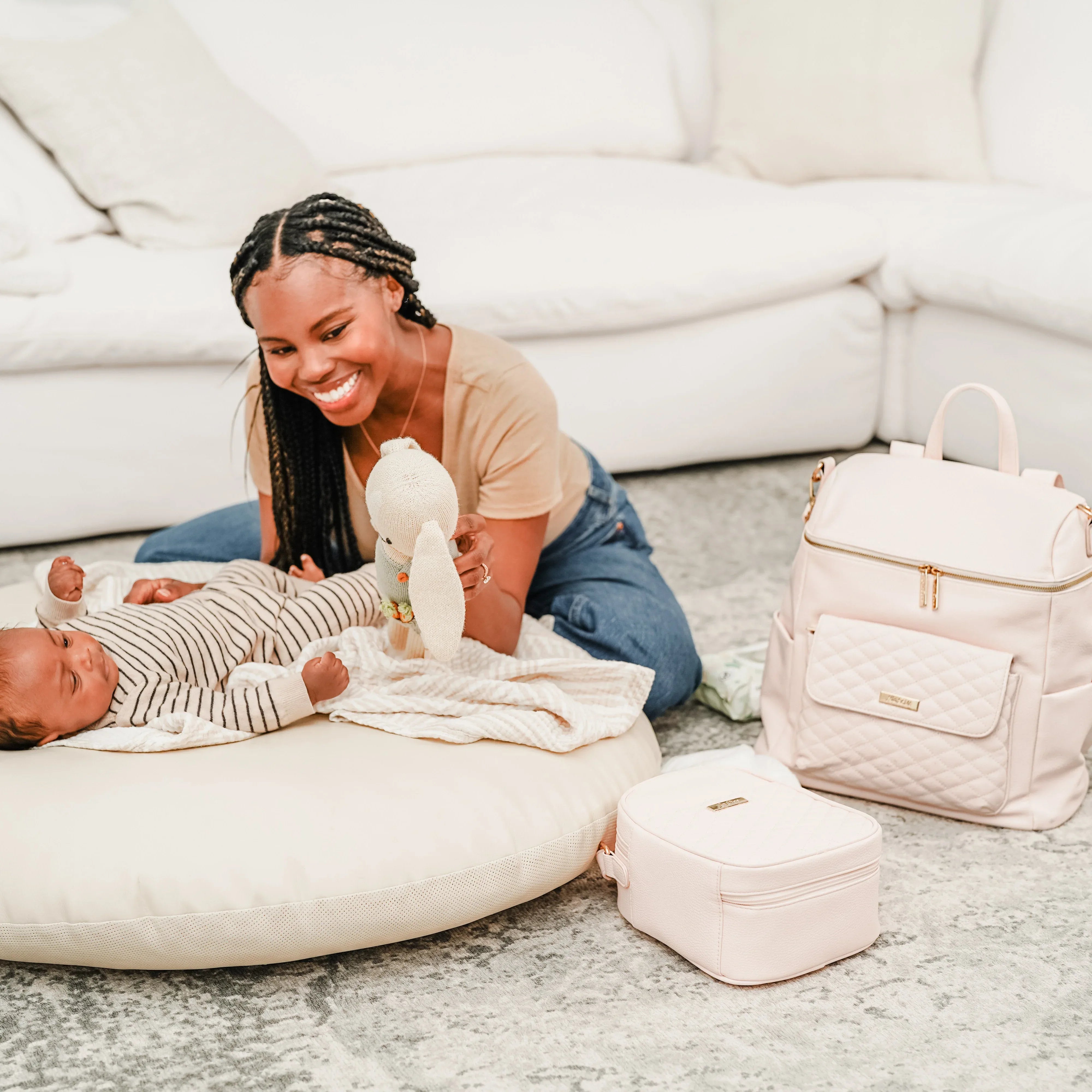 Large pink diaper bag side view – Monaco collection by Luli Bebe, mom playing with baby, stylish mom-approved diaper backpack