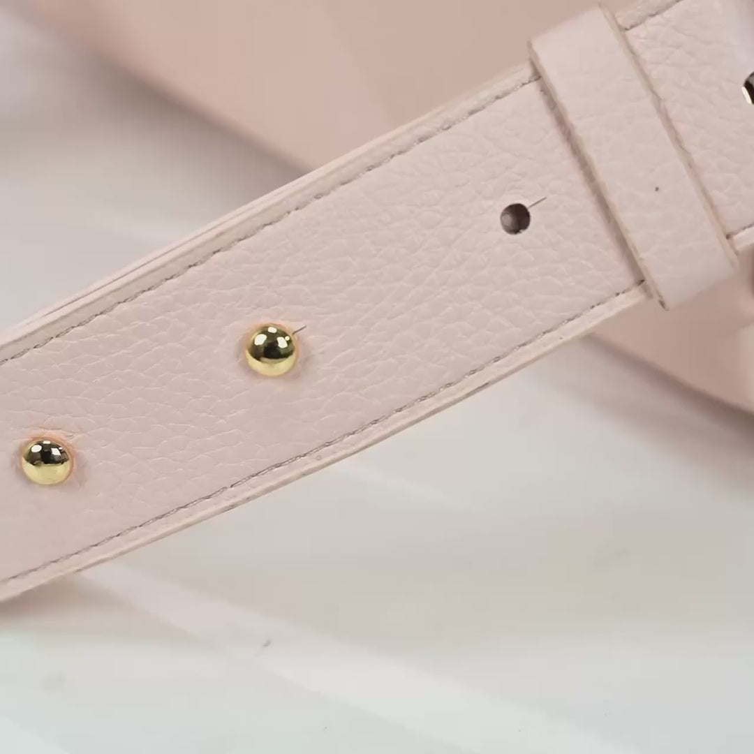 Large pink diaper bag in use – Luli Bebe Monaco collection video, luxury vegan leather backpack with spacious compartments and travel-ready design