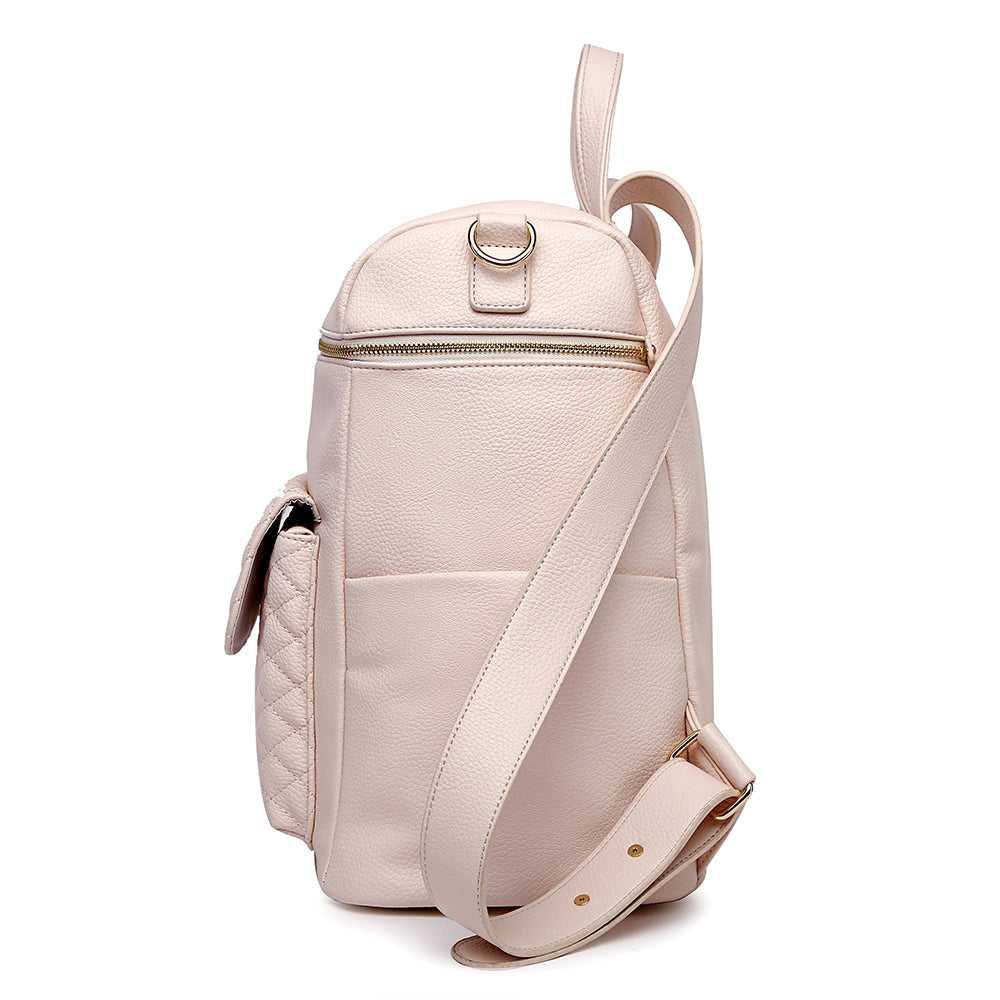 Pastel pink diaper bag side view by Luli Bebe, luxury vegan leather with pockets and stroller straps