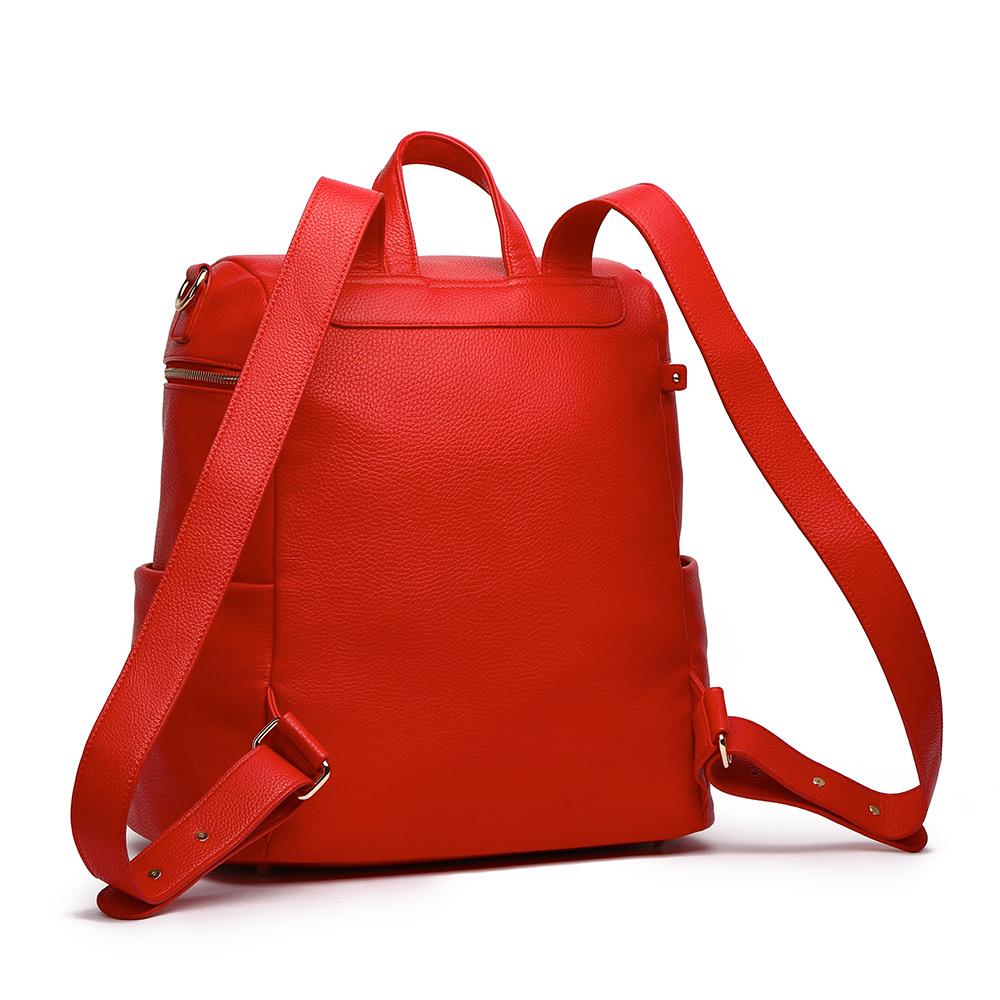 Imperfect Luli Bebé Monaco red vegan leather diaper bag backpack with quilted front pocket and gold hardware.