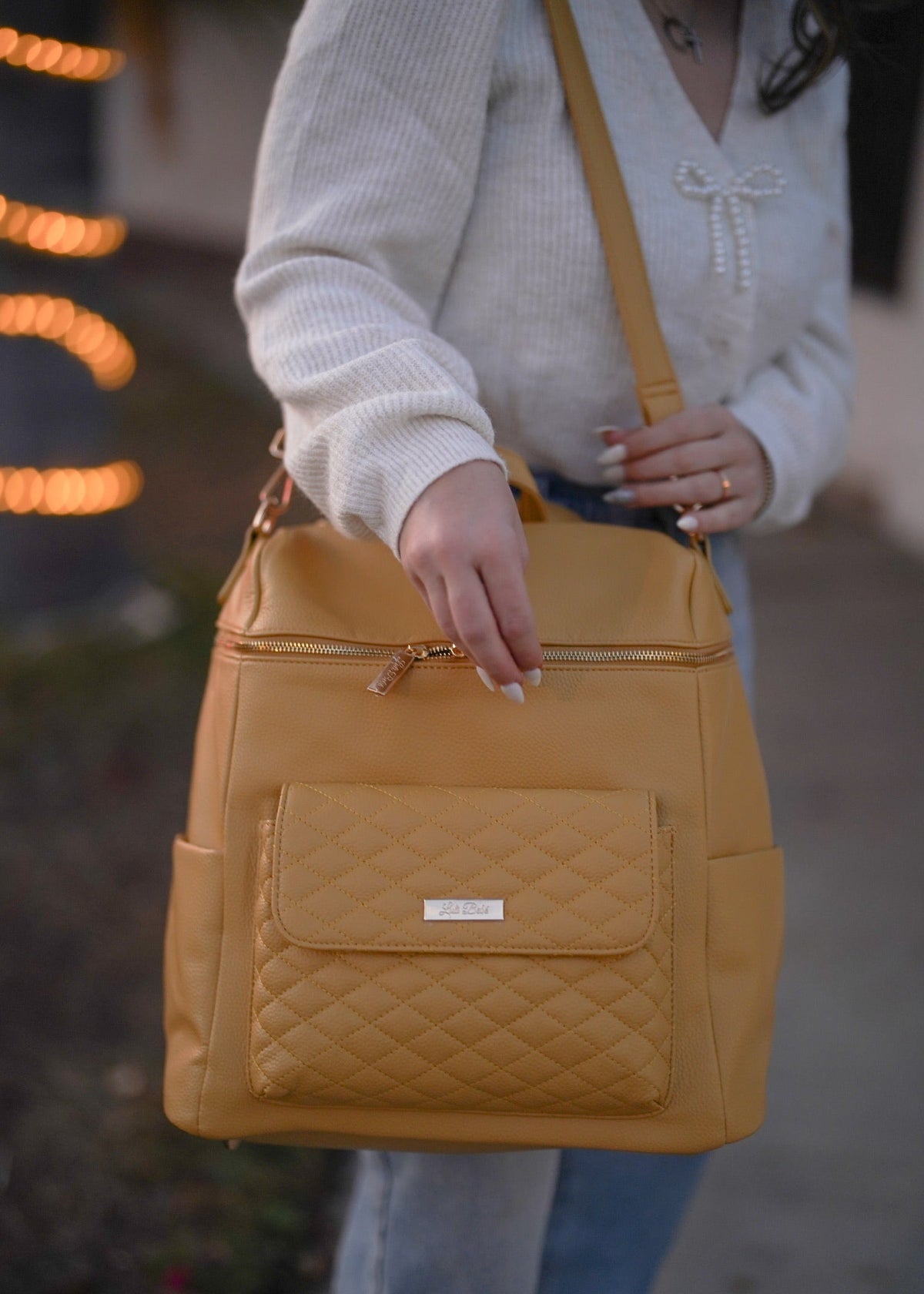 Imperfect Luli Bebé Monaco yellow vegan leather diaper bag backpack 