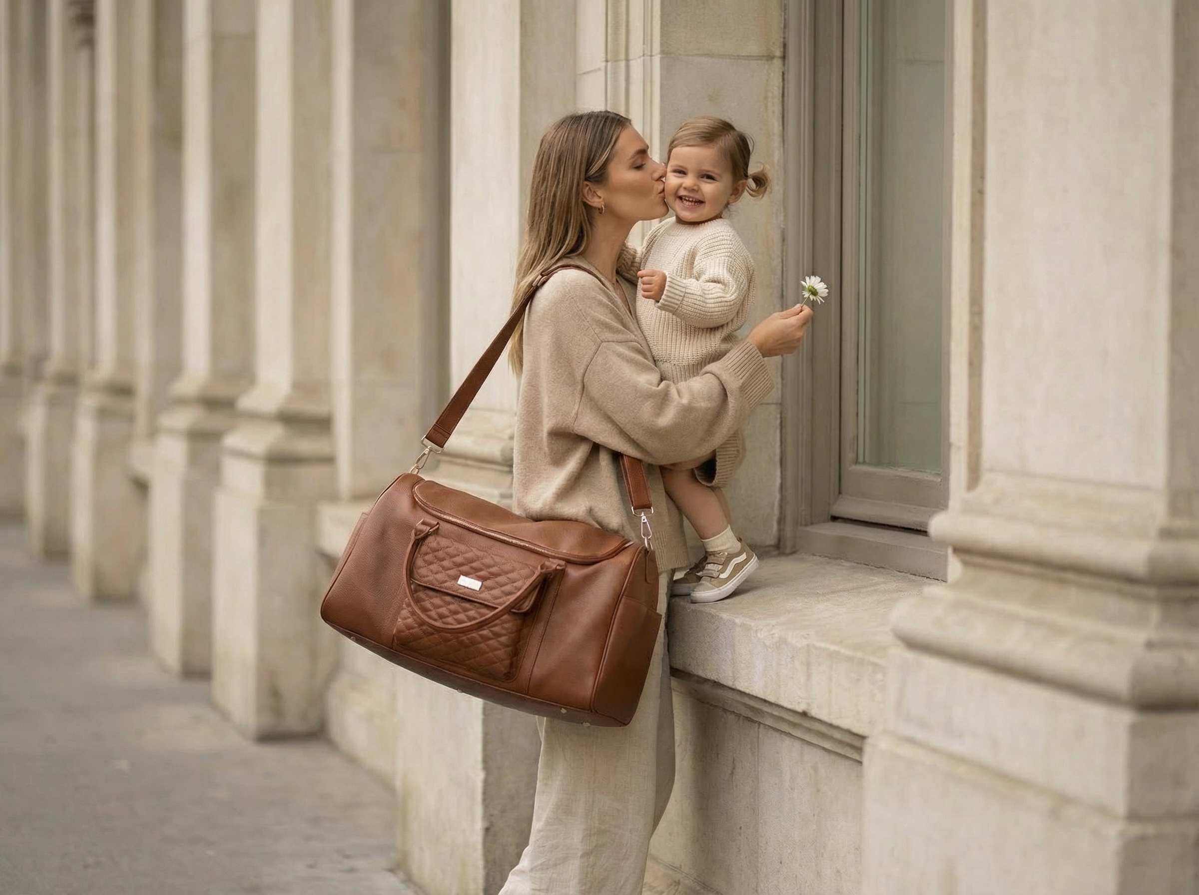 mom with diaper travel bag 