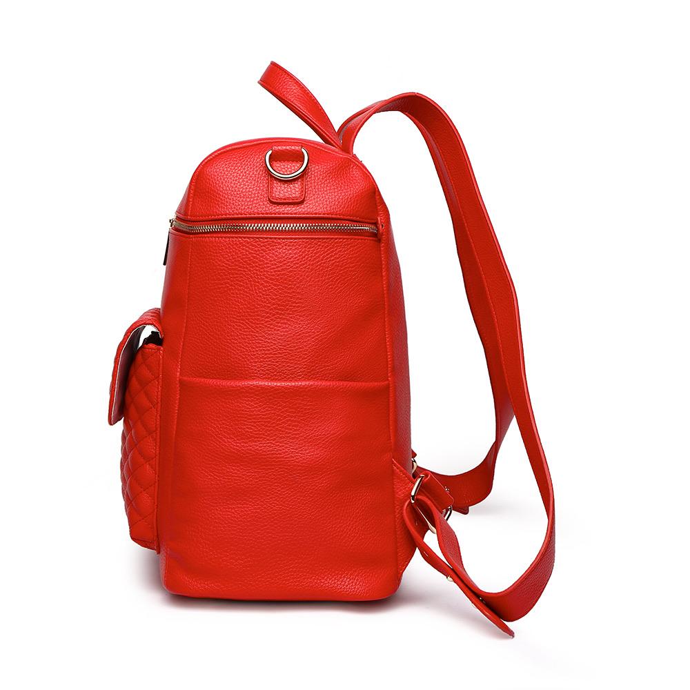 Imperfect Luli Bebé Monaco red vegan leather diaper bag backpack with quilted front pocket and gold hardware.