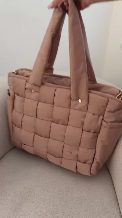 The Infinite Tote Latte diaper bag by Luli Bebé for everyday mom organization and travel.